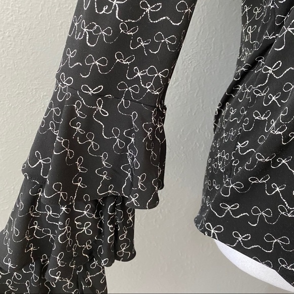 CeCe Danity Tiered Ruffled Bell Sleeve Bow Blouse - Picture 4 of 11